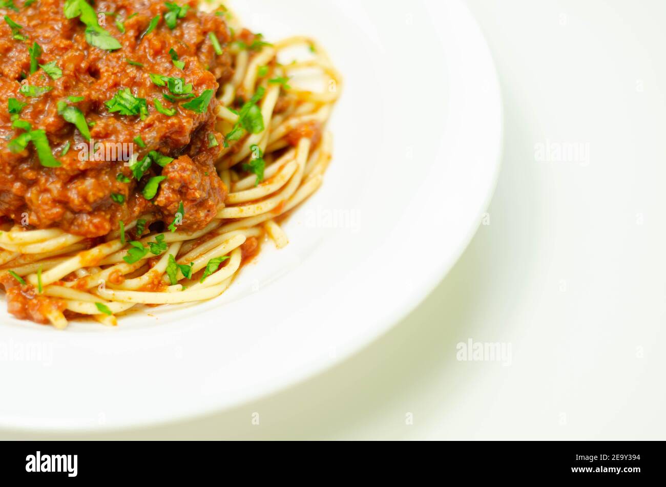 Minced beef bolognese with onions and carrots served with spaghetti