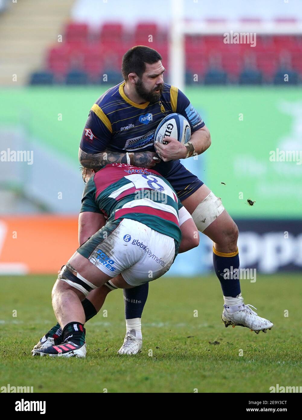 Leicester Tigers' Jasper Wiese tackles Worcester Warriors' Marco Mama during the Gallagher Premiership match at Welford Road, Leicester. Picture date: Saturday February 6, 2021. Stock Photo