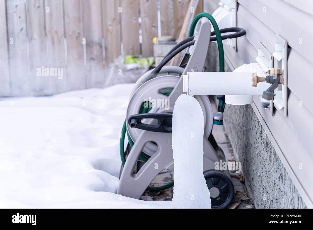 Furnace exhaust pipe blowing out steam in winter Stock Photo
