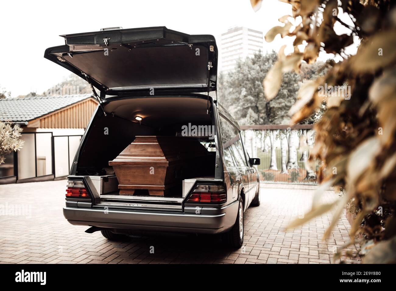 wooden coffin in the back of a car at the crematory Stock Photo Alamy