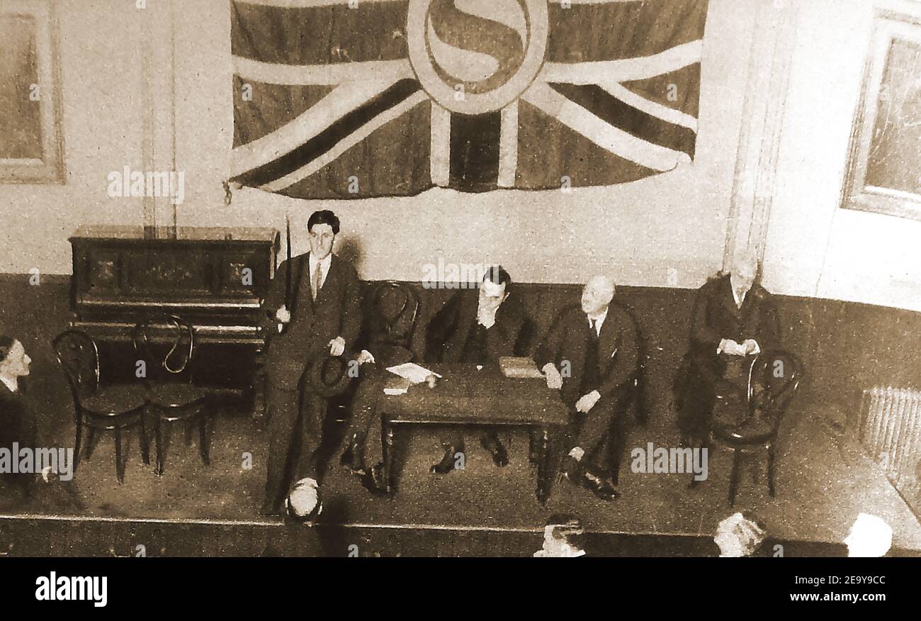 1919 PROHIBITION - American speaker W Johnson'  at Essex hall, London UK . He was ridiculed and lost an eye whilst being forcibly paraded through the streets of London on a stretcher by medical students. William Eugene 'Pussyfoot' Johnson ( 1862 -1945) was an American Prohibition advocate and law enforcement officer who travelled to Britain with the hope of introducing prohibition there.  In America he frequented  US  'speak easy' establishments  under cover and reported them to the authorities. He was known in Oklahoma as  “the gent with the panther tread” due to his softly-softly approach. Stock Photo