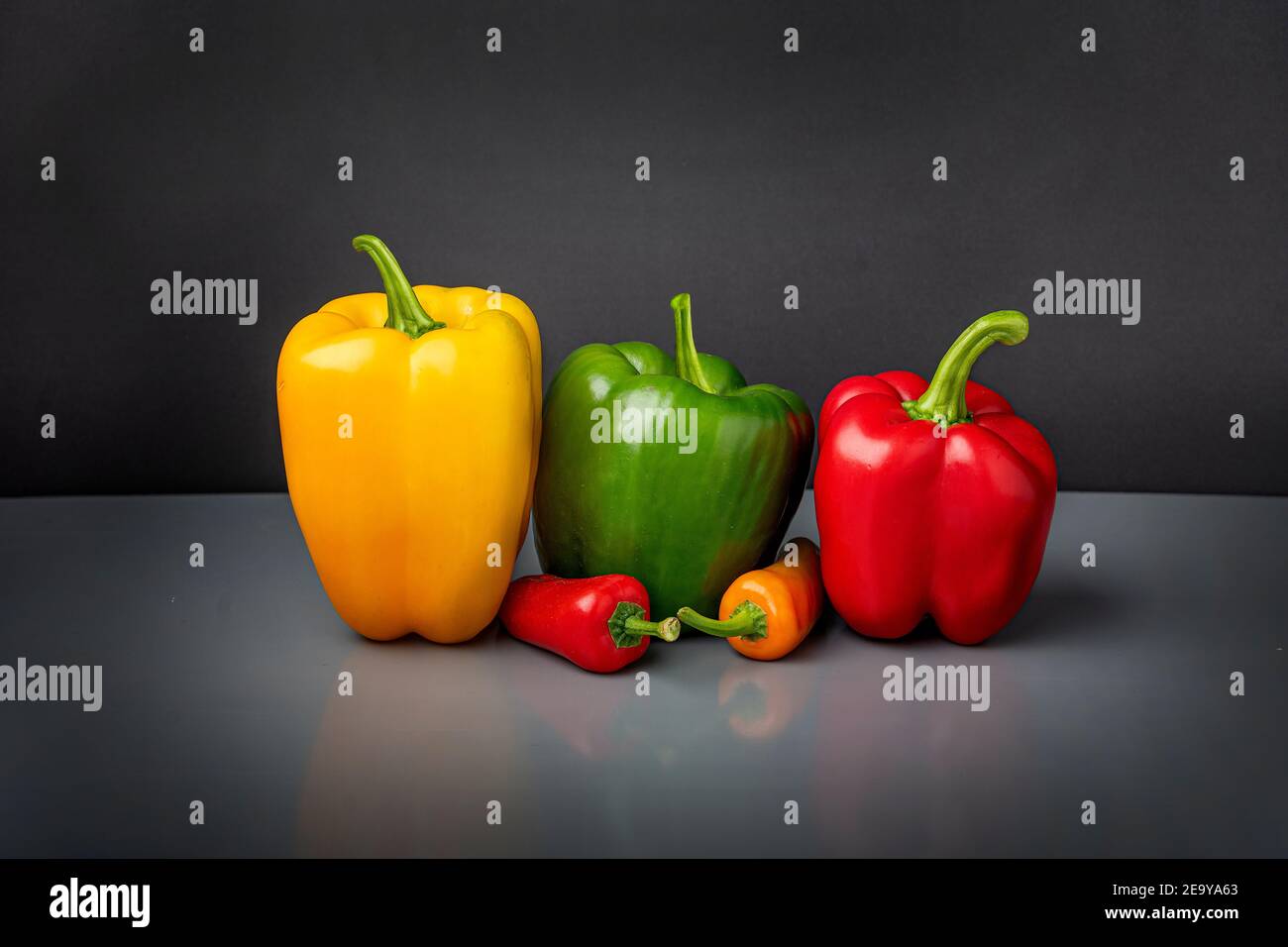 Chopped green red yellow peppers hi-res stock photography and images ...