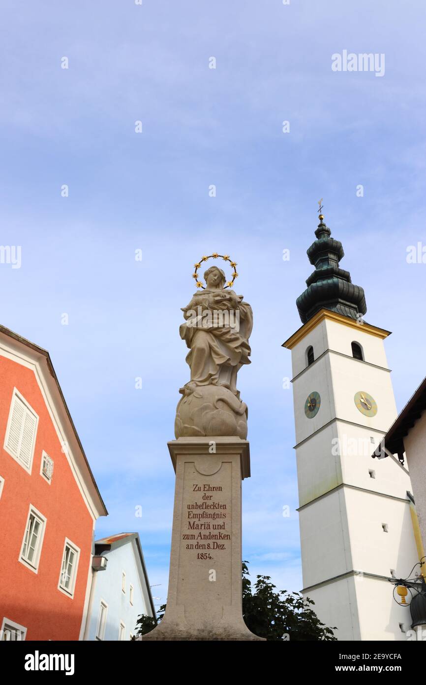 GERMANY, BAVARIA, WAGING AM SEE - SEPTEMBER 22, 2019: Marian column and church St. Martin in Waging am See Stock Photo
