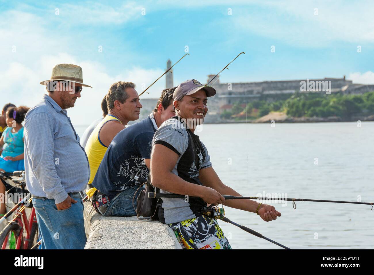 Cuban people fishing in El Malecon, Havana, Cuba Stock Photo Alamy