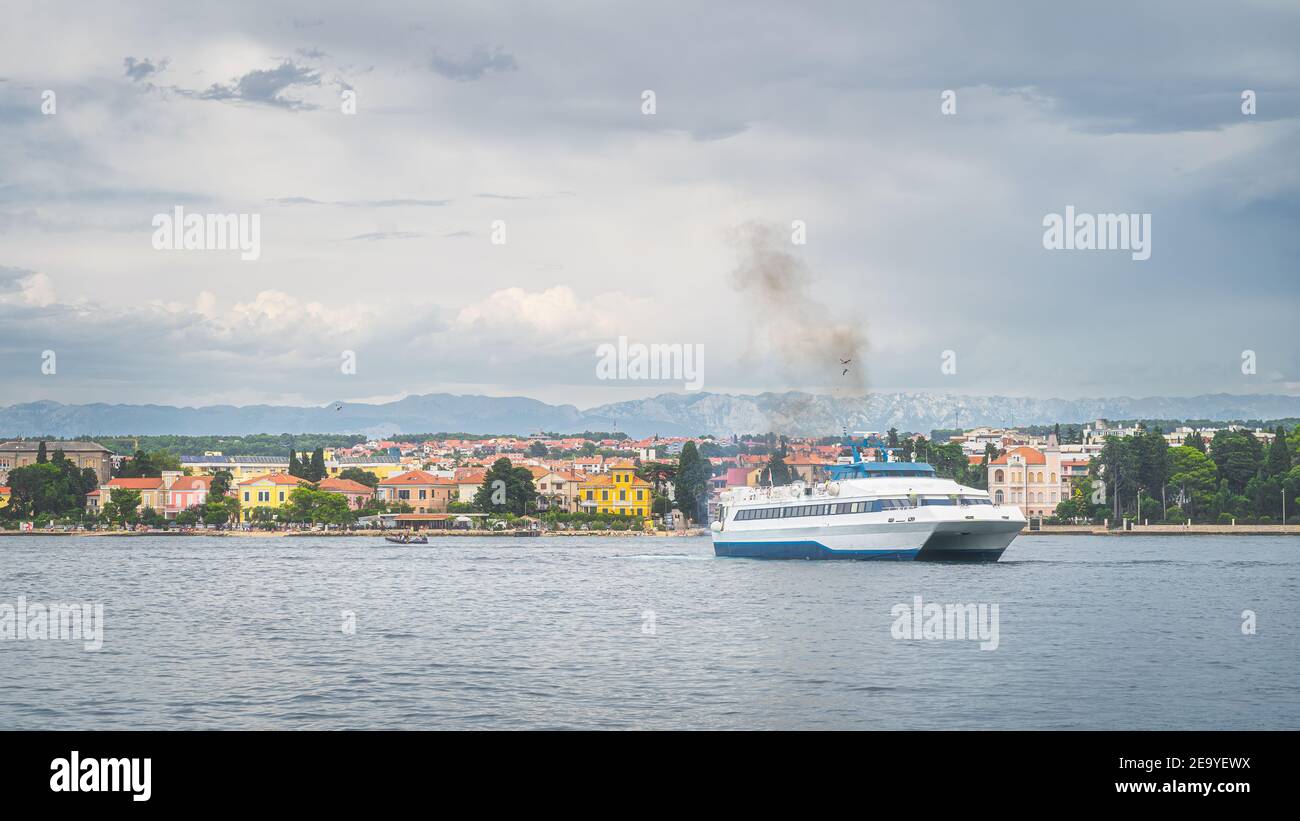 Passenger Ferry Entering Zadar Bay From Adriatic Sea Cruise Ship Mooring In Harbour With Urban And Mountain Range Dinaric Alps Coastline Croatia Stock Photo Alamy