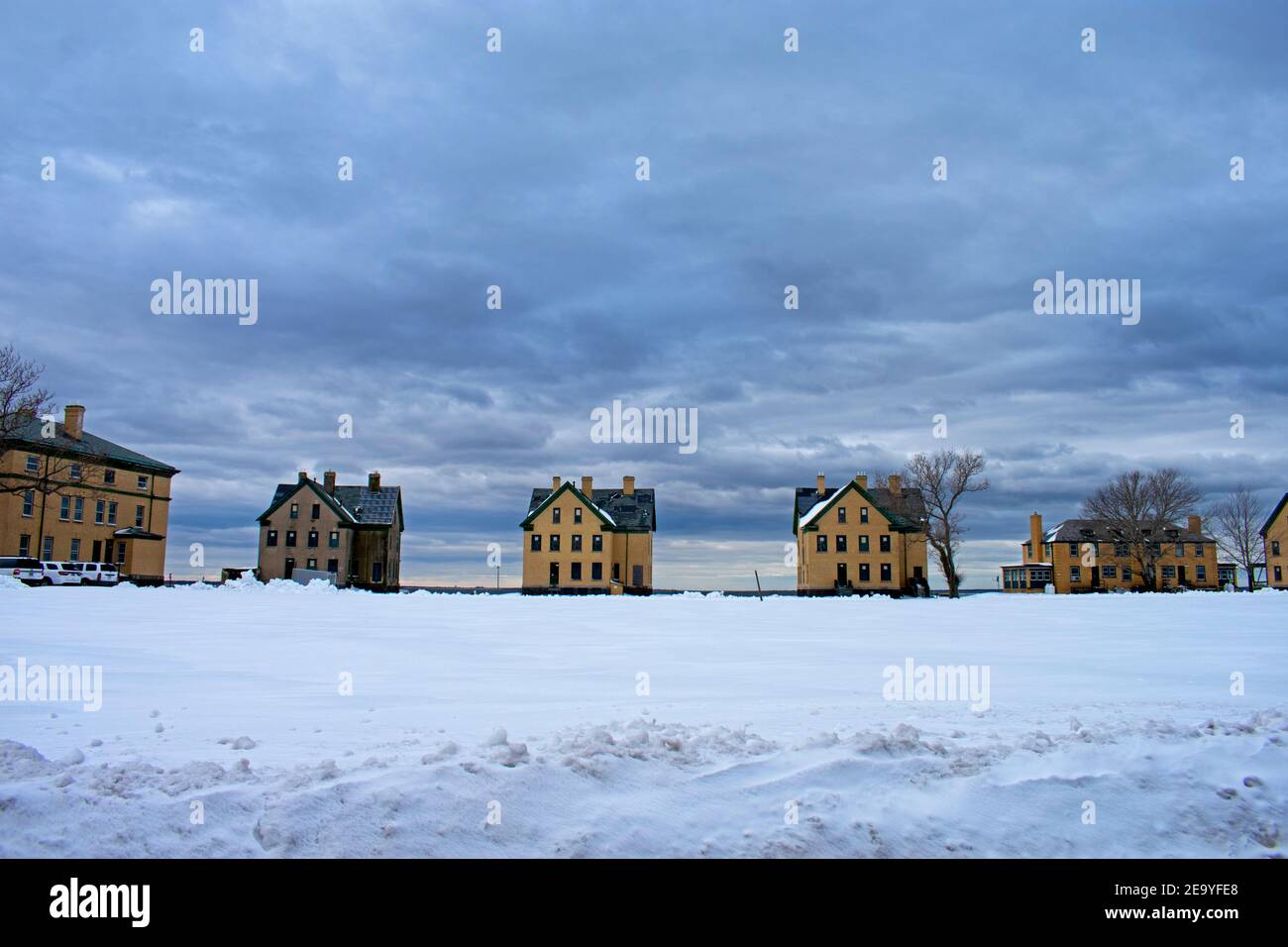 Officer's row quarters at Fort Hancock, Sandy Hook, New Jersey, after a heavy mid-winter snow storm -22 Stock Photo