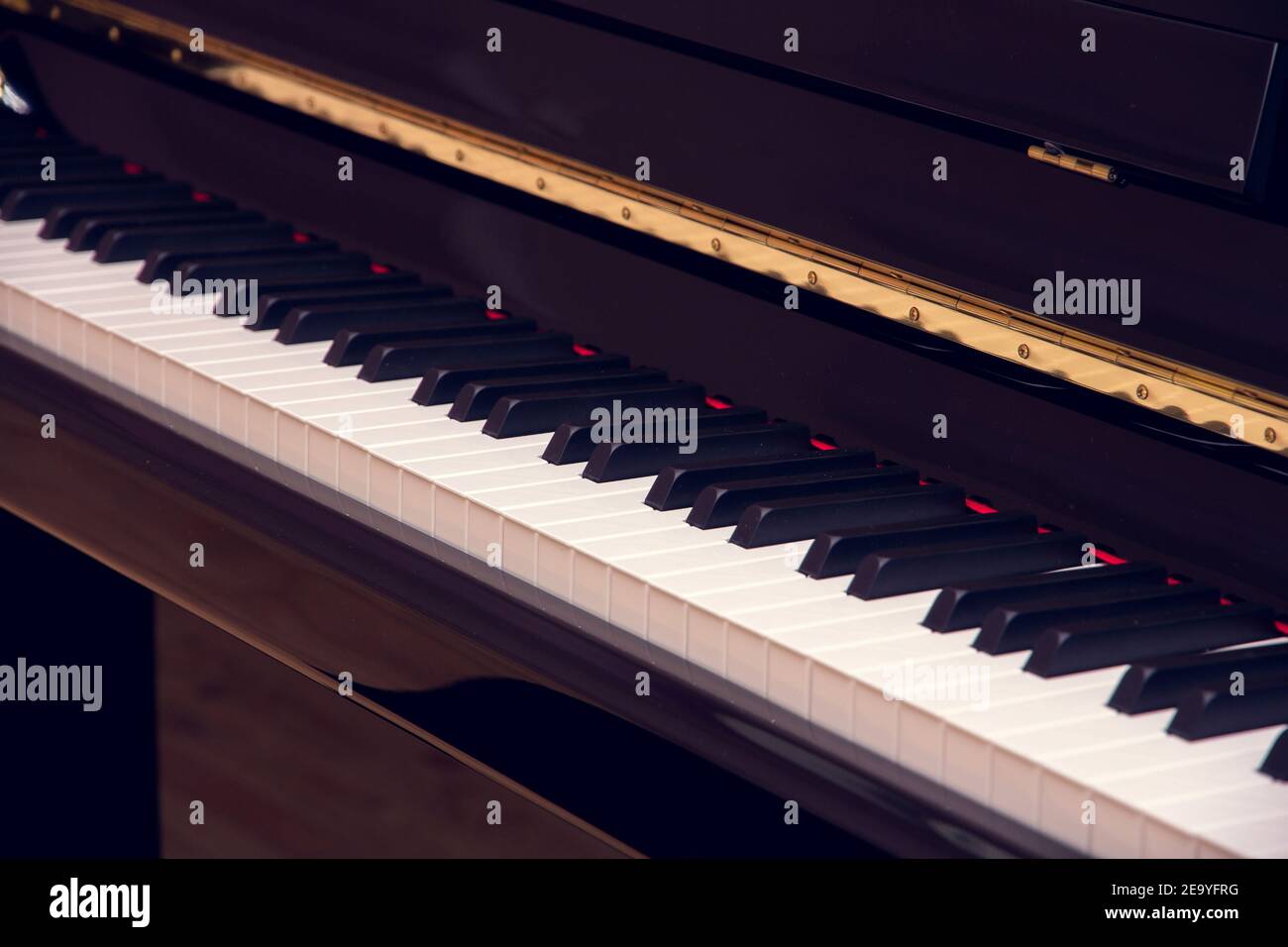 A brand new piano in the classroom. Closeup of Piano Keyboard. Piano