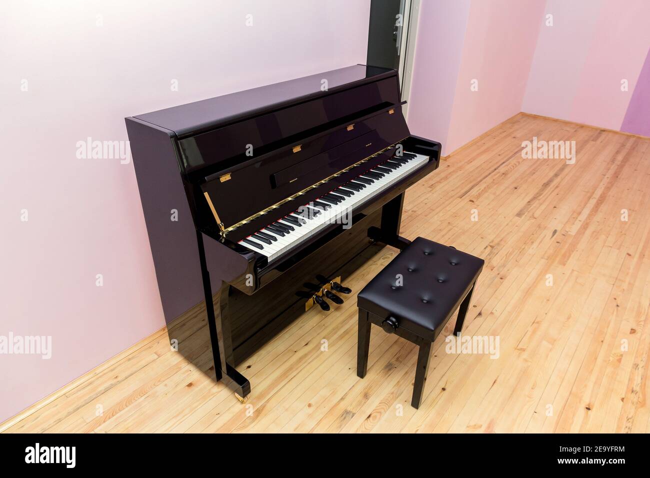 A brand new piano in the classroom. Piano training class. Music class