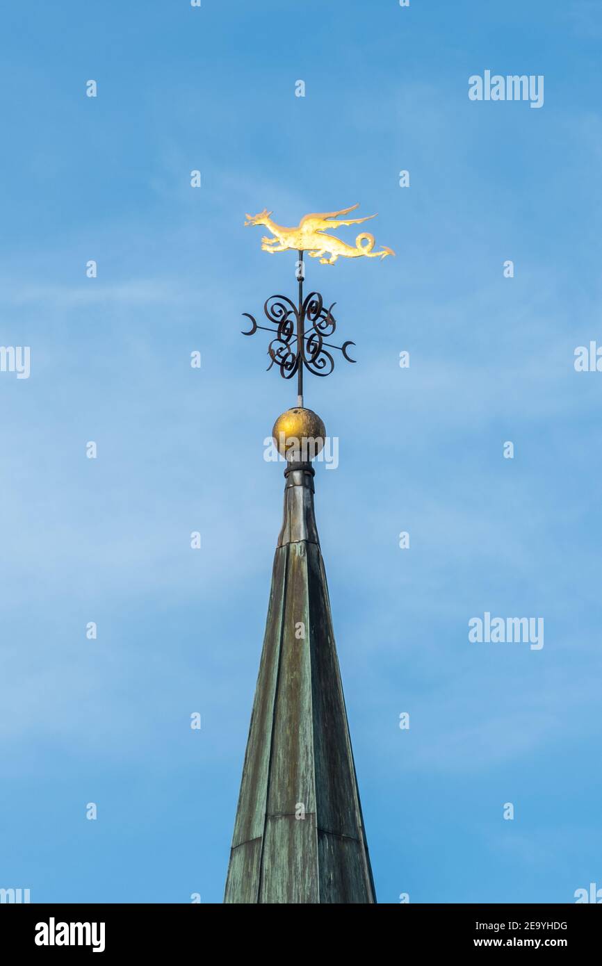 Dragon shaped weather vane on top of St.Michael & All Angels Church spire, Pirbright, Surrey, UK Stock Photo