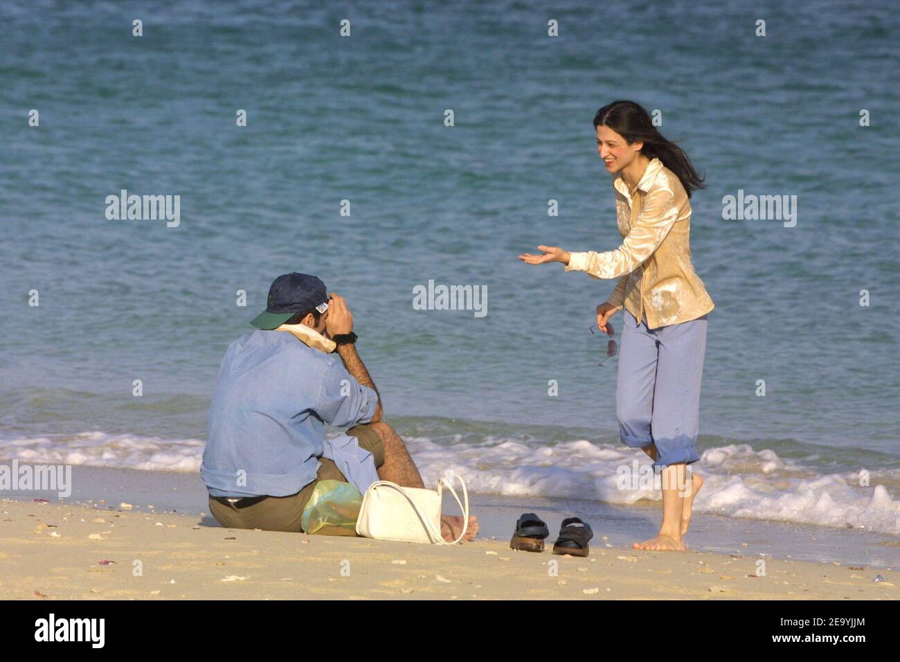 A young couple on a beach of Iran's island Kish, in the Persian Gulf, in April 2004. Photo by Orand-Viala/ABACA. Stock Photo