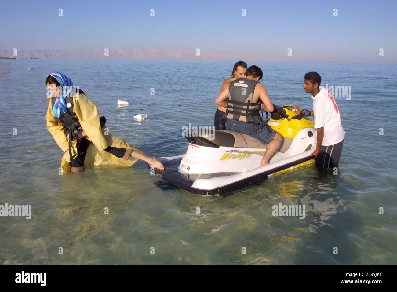 An Iranian couple riding a skidoo off Iran's island Kish, in the Persian Gulf, in April 2004. Photo by Orand-Viala/ABACA. Stock Photo