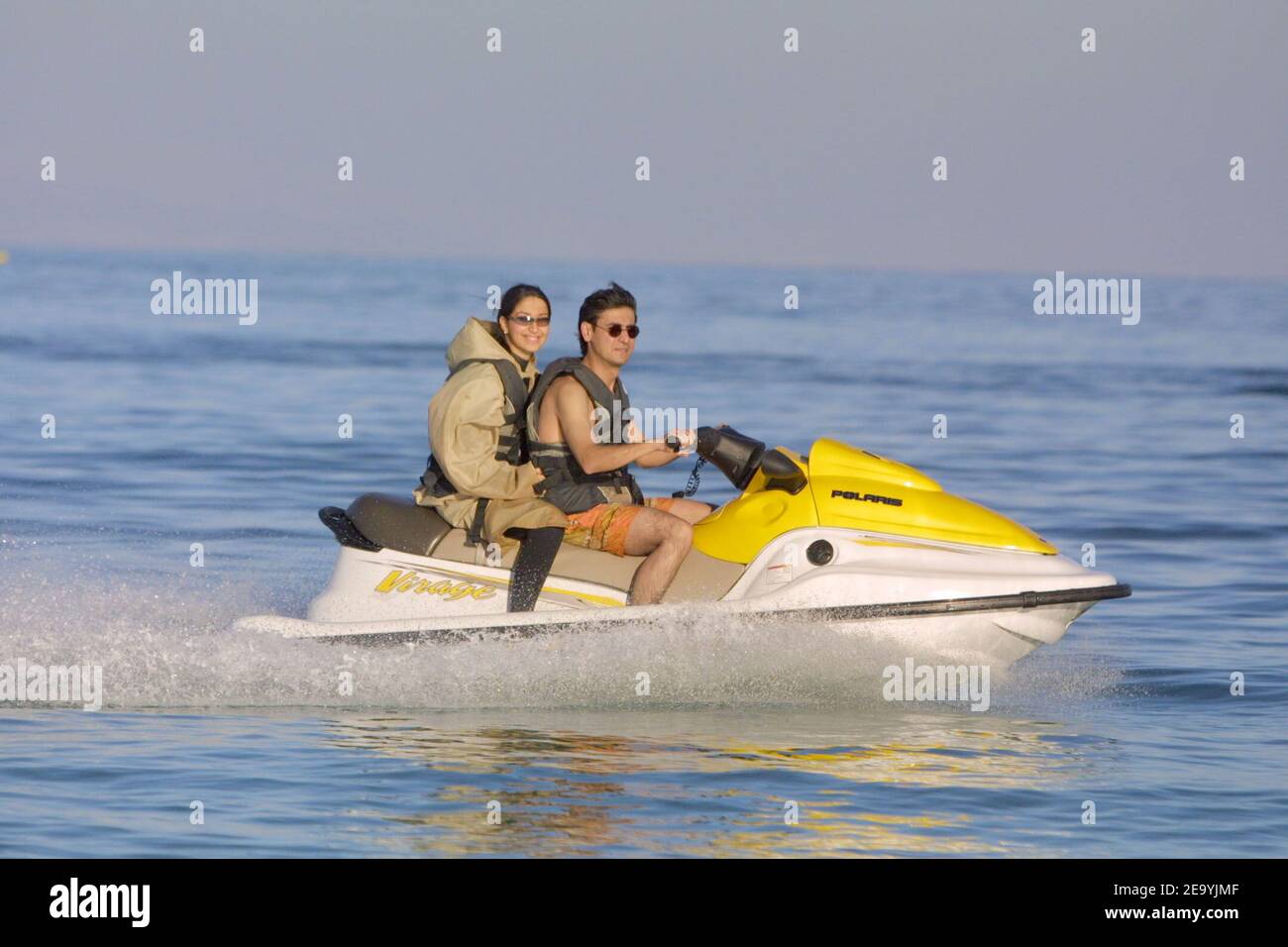 An Iranian couple riding a skidoo off Iran's island Kish, in the Persian Gulf, in April 2004. Photo by Orand-Viala/ABACA. Stock Photo