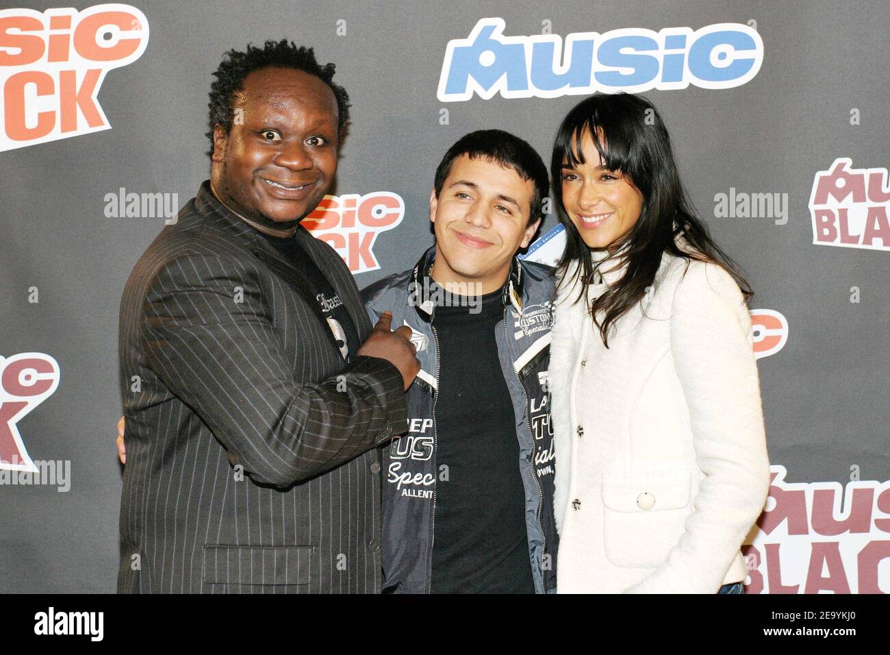 (L-R) French TV presenter Magloire, Rai singer Faudel and TV presenter Karine Lima attend the launch party for M6' new TV channels 'M6 Rock' and 'M6 Black' at Salle Wagram in Paris, France, on January 10, 2005. Photo by Benoit Pinguet/ABACA. Stock Photo