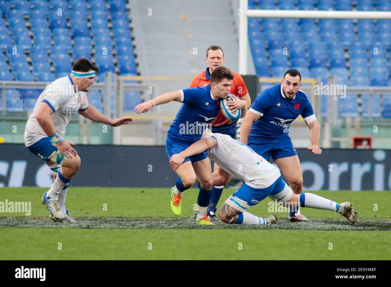 Matthieu Jalibert (France) is tackled by Marco Lazzaroni (Italy),  Jean-Baptiste Gros (France) during the 2021 Six Nations championship rugby  union match between Italy and France on January 6, 2021 at Stadio Olimpico
