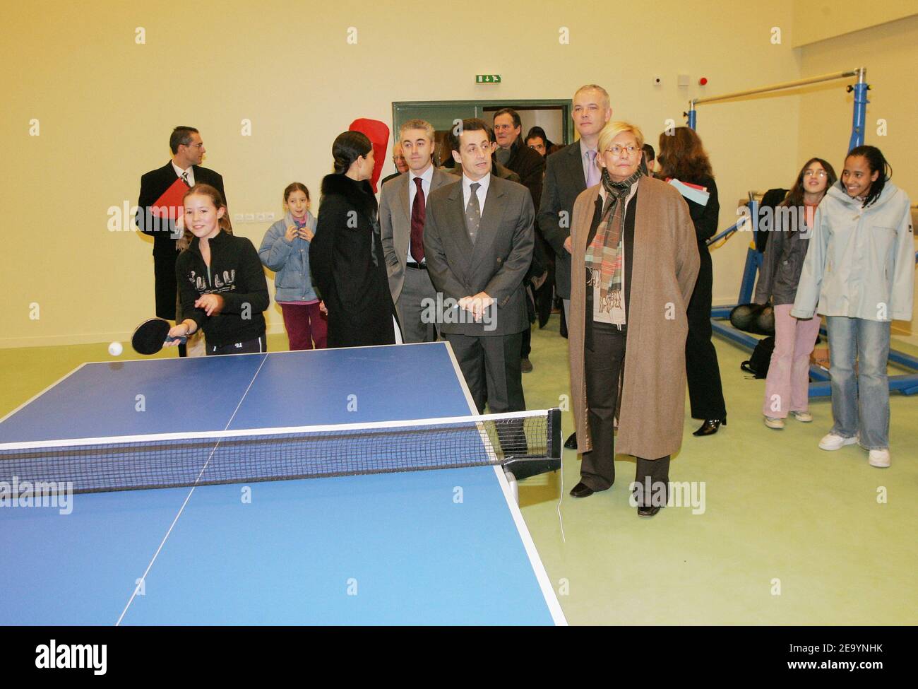 Nicolas Sarkozy (C), as President of the Hauts-de-Seine General Council, with Asnieres mayor Manuel Aeschlimann (L) and Vice-President Isabelle Balkany (R), meets teachers and students of the 4th College in Asnieres, near Paris, France, on January 17, 2005, as part of his decision to visit every week one city of his department. Photo by Mousse/ABACA. Stock Photo