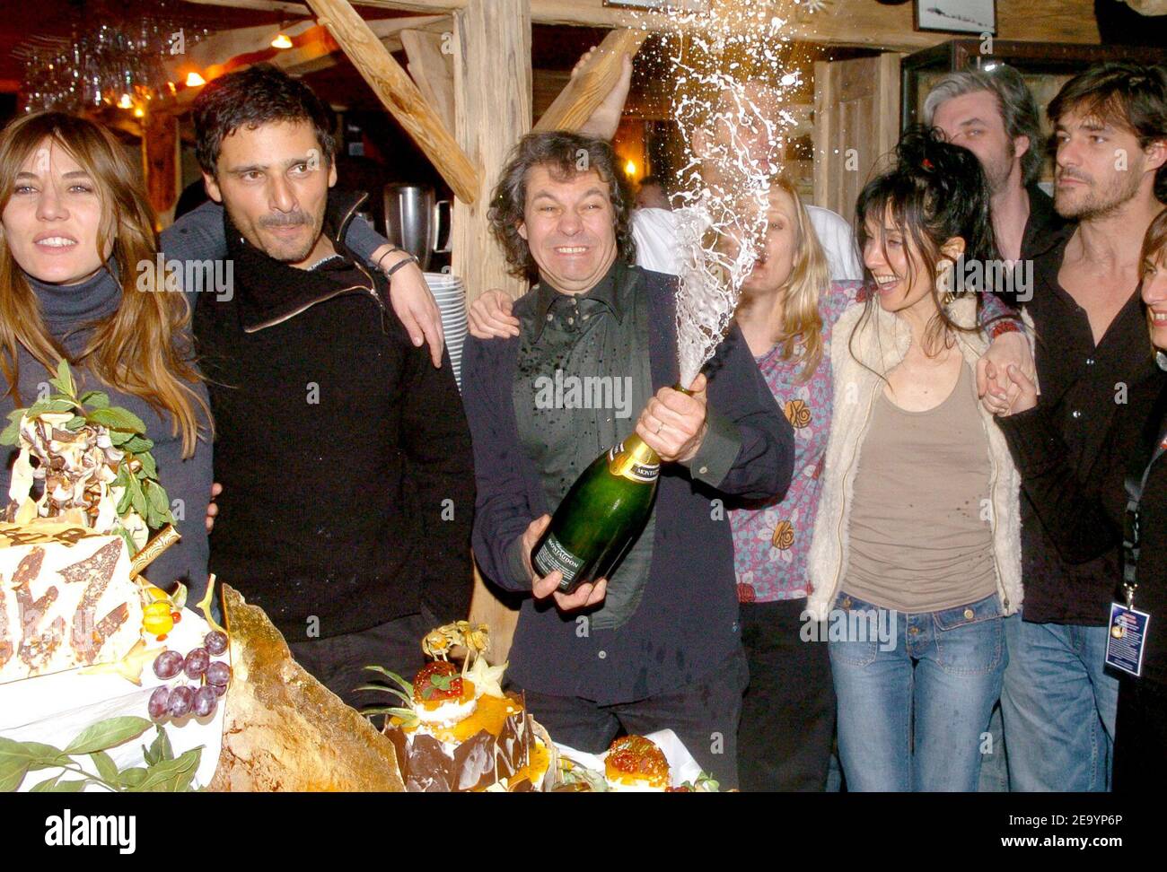 (L-R) French actress Mathilde Seigner (L), actor Pascal Elbe, producer Yann Gilbert, director Cecile Telerman, actress Anne Parillaud, Mathilde Seigner's boyfriend Fabien Blaise and actor Thierry Neuvic celebrate Mathilde Seigner's birthday during the 8th International Comedy Film Festival in L'Alpe d'Huez, French Alps, on January 18, 2005. Their film 'Tout pour plaire' has been presented at the festival's opening ceremony. Photo by Bruno Klein/ABACA. Stock Photo