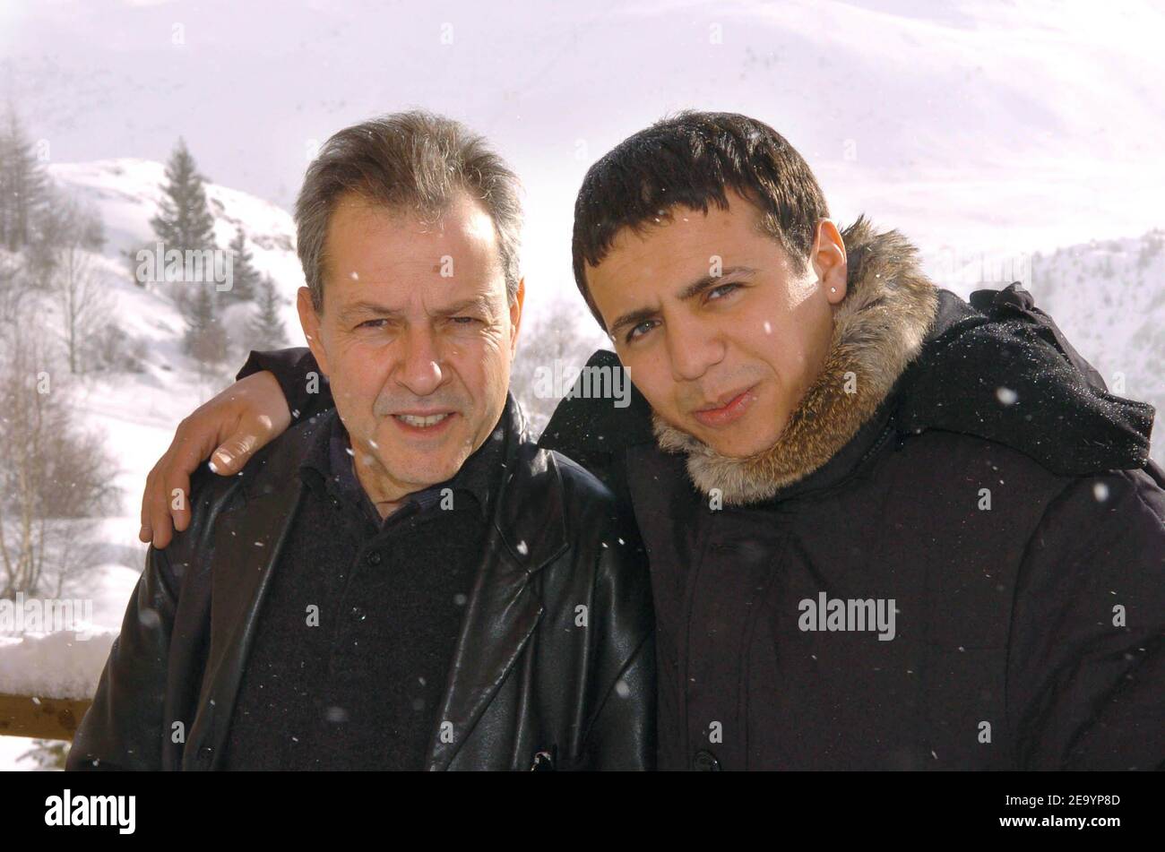 French rai singer and actor Faudel poses at a photocall for his movie 'Bab El Web' directed by Merzak Allouache (l) during the 'Festival du Film de Comedie' in l'Alpe d'Huez, France on January 19, 2005. Photo by Bruno Klein/ABACA Stock Photo