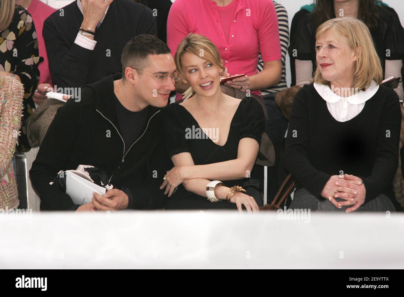 (L-R) William Baker, Australian singer Kylie Minogue and British singer Marianne Faithfull attend the presentation of the 2005 Spring-Summer Haute-Couture collection by German designer Karl Lagerfeld for French fashion house Chanel at Ateliers Berthier in Paris, France, on January 25, 2005. Photo by Klein-Nebinger/ABACA. Stock Photo