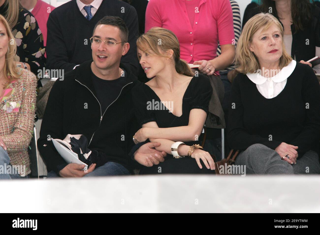 (L-R) William Baker, Australian singer Kylie Minogue and British singer Marianne Faithfull attend the presentation of the 2005 Spring-Summer Haute-Couture collection by German designer Karl Lagerfeld for French fashion house Chanel at Ateliers Berthier in Paris, France, on January 25, 2005. Photo by Klein-Nebinger/ABACA. Stock Photo