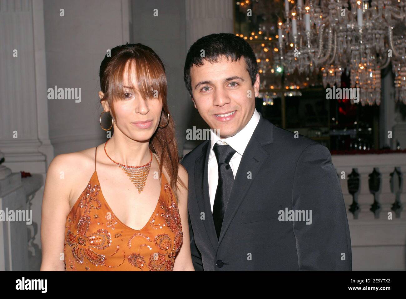 Algerian born rai singer Faudel and his wife Anissa arrive at the Haute-Couture Ball organized by Lebanese fashion designer Elie Saab at La Maison Baccarat in Paris, France, on January 24, 2005. Photo by Benoit Pinguet/ABACA. Stock Photo