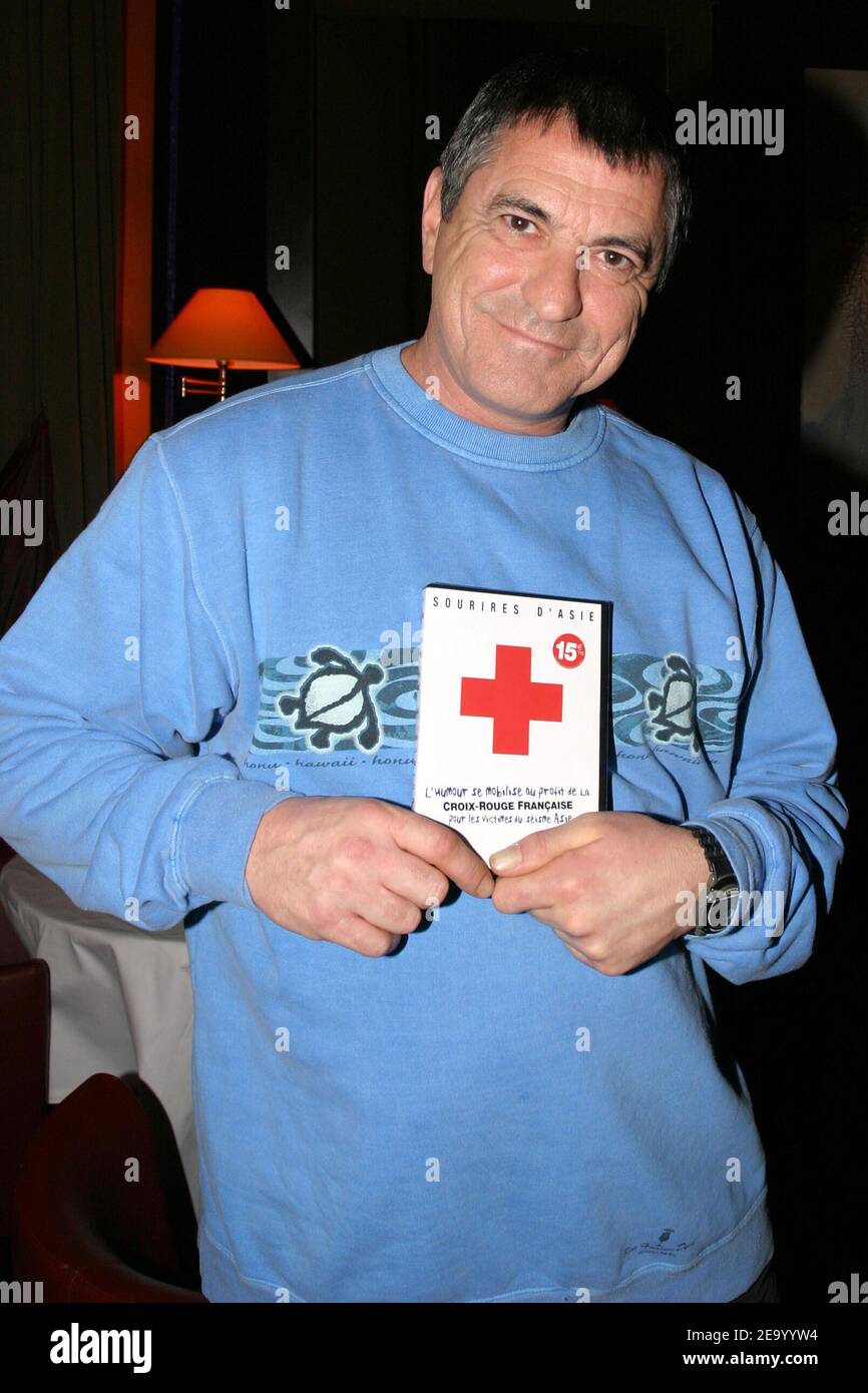 French humorist Jean-Marie Bigard during the launch party for the DVD 'Sourires d'Asie' (Smiles from Asia') for the benefit of the South Asian tsunami victims, at L'Etoile in Paris, France, on February 2, 2005. Photo by Benoit Pinguet/ABACA Stock Photo