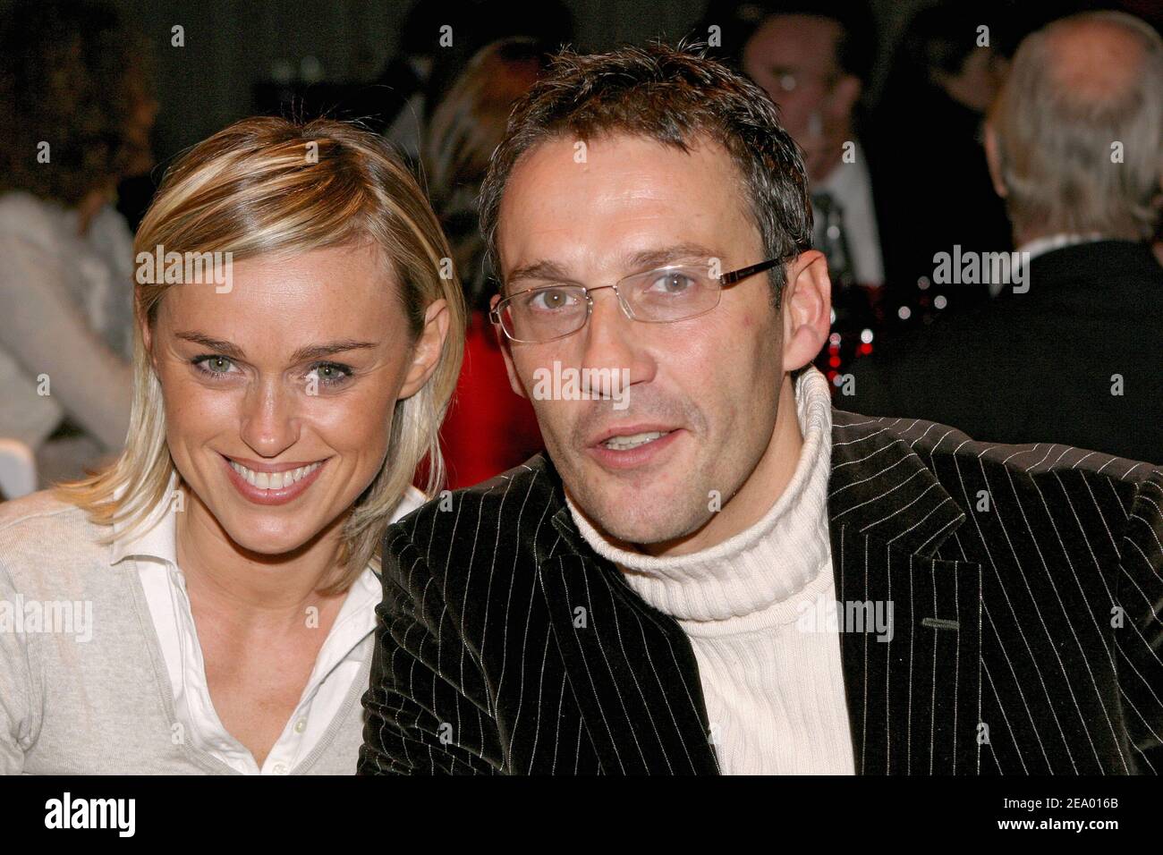 French TV presenters Cecile de Menibus and Julien Courbet pose during 'Le  Gala du Ring' at the Cirque d'Hiver Bouglione in Paris, France, on February  8, 2005. The event was organized by