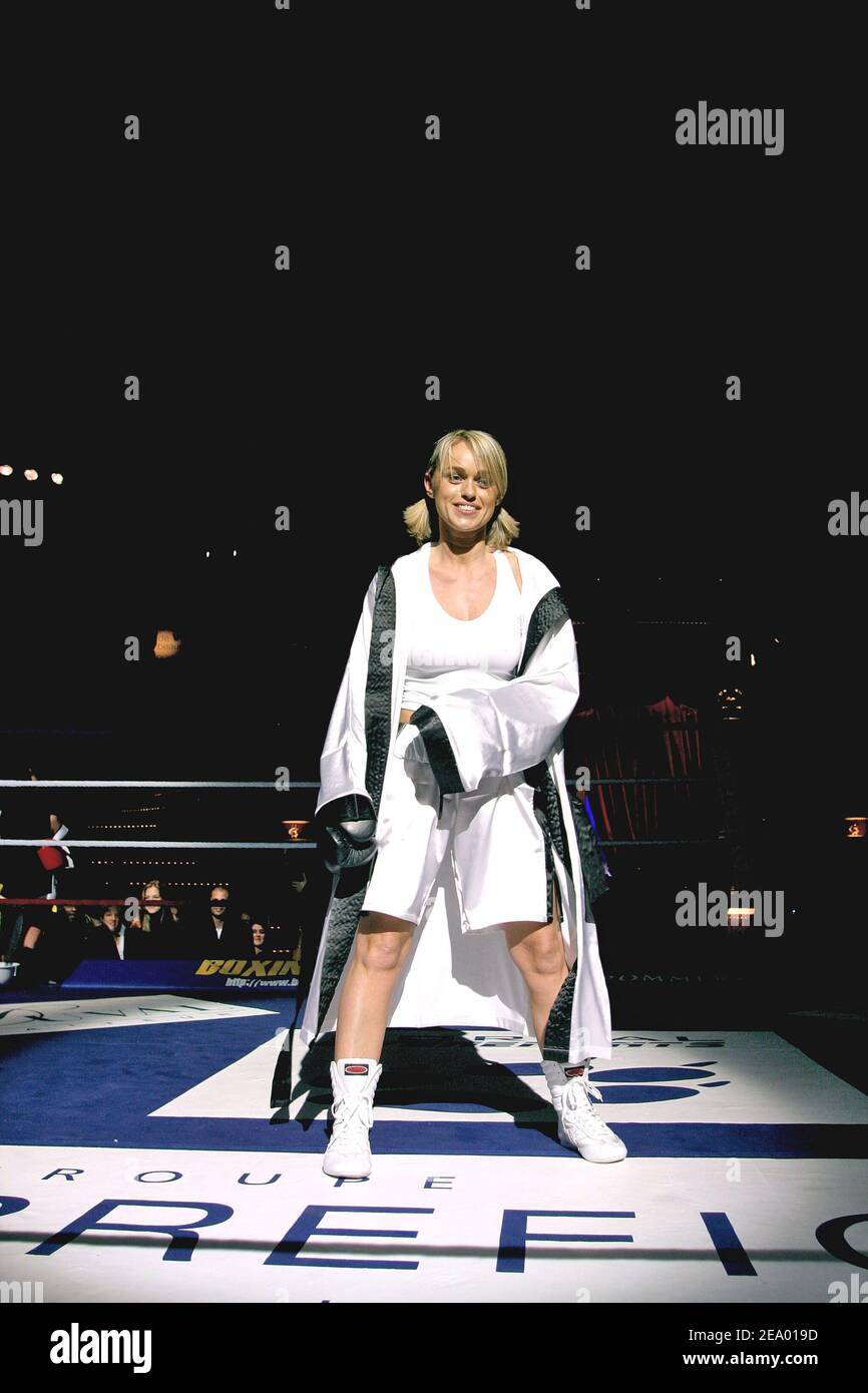 French TV presenter Cecile de Menibus participates in a boxing match during  'Le Gala du Ring' at the Cirque d'Hiver Bouglione in Paris, France, on  February 8, 2005. The event was organized