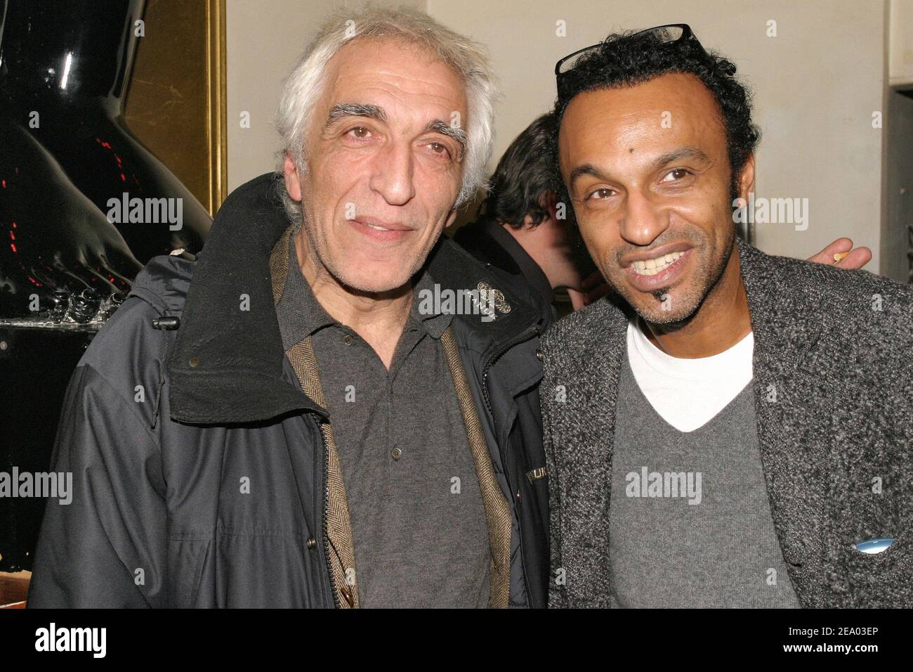 French actor Gerard Darmon (L) and musician Manou Katche attend the Cellboost party for mobile phone accessories organized by Worldline Communications at the VIP Room in Paris, France, on February 17, 2005. Photo by Benoit Pinguet/ABACA. Stock Photo