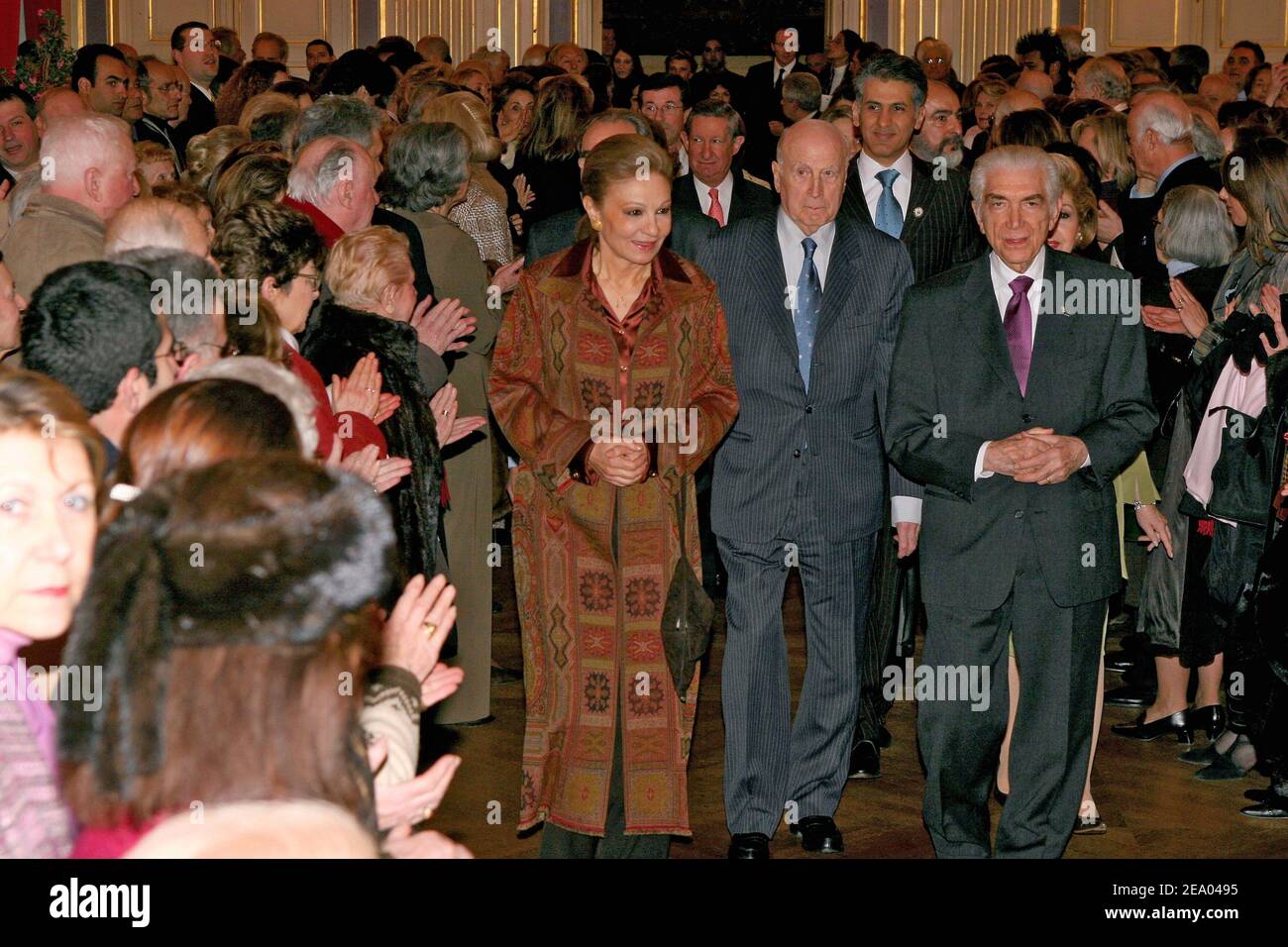 (L-R) Former Empress Farah Diba of Iran, Pierre-Christian Taittinger and Prince Gholam-Reza Pahlavi, brother of the late shah of Iran, during the presentation of Prince Gholam-Reza's book, 'Mon pere, mon frere, les Shahs d'Iran', (My father, my brother, the Shahs of Iran) at the 16th district's town hall in Paris, France, on February 24, 2005. Photo by Mousse/ABACA. Stock Photo