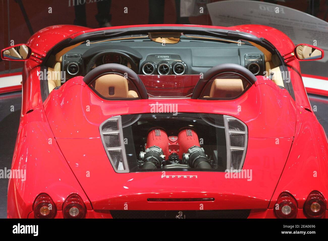 The new Ferrari F430 Spyder is on display during its first world presentation at the 75th Geneva motor show in Geneva, Switzerland, on March 2, 2005. Maranello's new convertible is the same 4.3-litre V8 found in the F430 hardtop. Producing 490 hp at a soaring 8500 rpm, the 90-degree unit should propel the F430 Spyder from 0-60 mph in the low four-second range. Photo by Laurent Zabulon/ABACA. Stock Photo