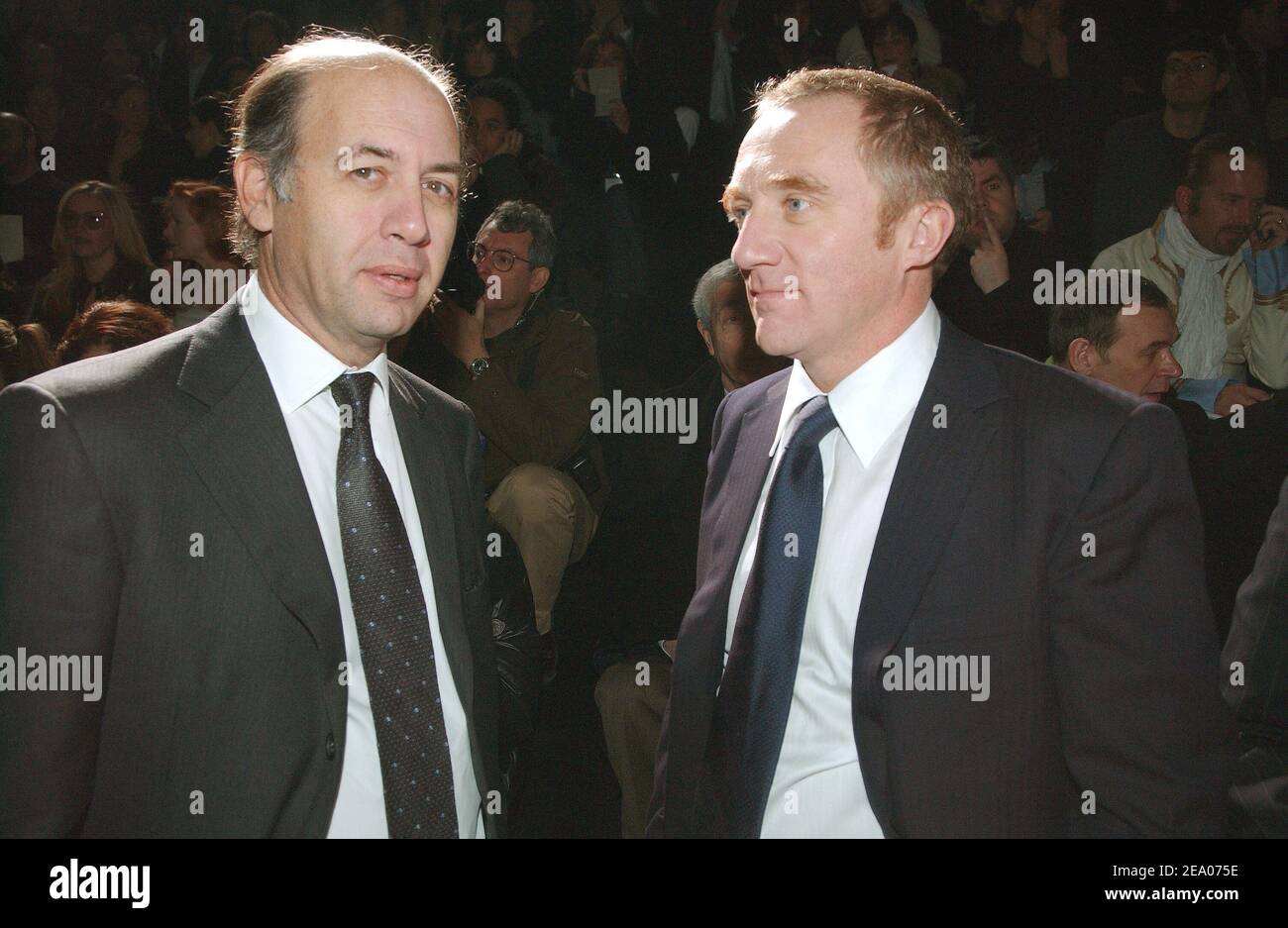 Pinault-Printemps-Redoute chairman and chief executive Serge Weinberg (L)  and Francois-Henri Pinault, son of the group's founder and largest  shareholder Francois Pinault, after the presentation of Stella McCartney's  Fall/Winter 2005/2006 ready-to-wear ...