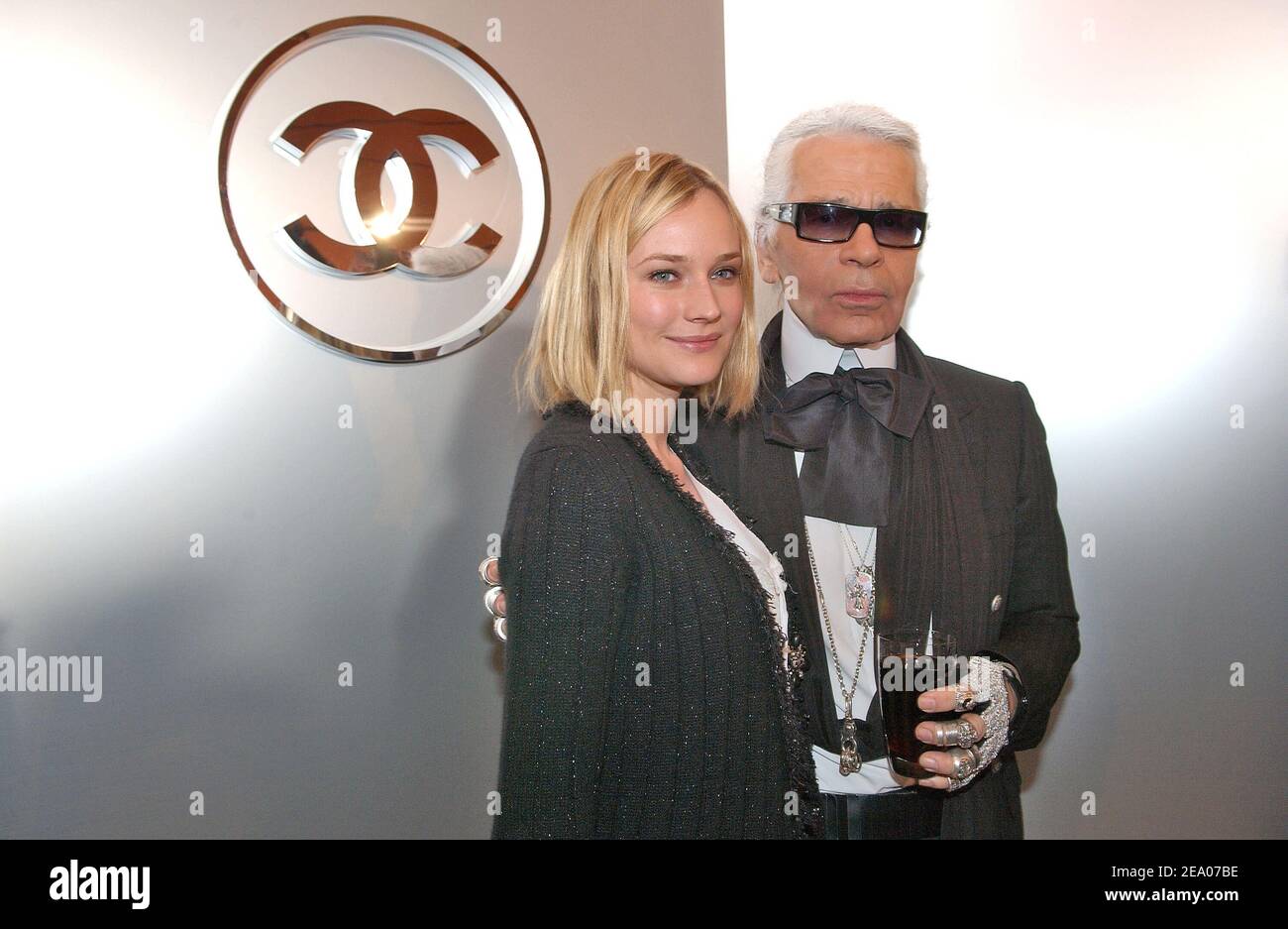 German born actress Diane Kruger and German fashion designer Karl Lagerfeld pictured during the backsatge of the Chanel Ready-to-Wear Fall-Winter 2005-2006 collection in Paris-France on March 4, 2005. Photo by Klein-Hounsfield/ABACA. Stock Photo