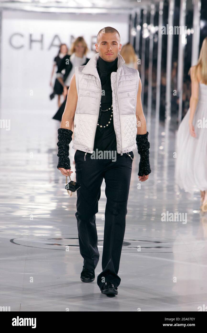 A model displays a creation by Karl Lagerfeld for Chanel Fall