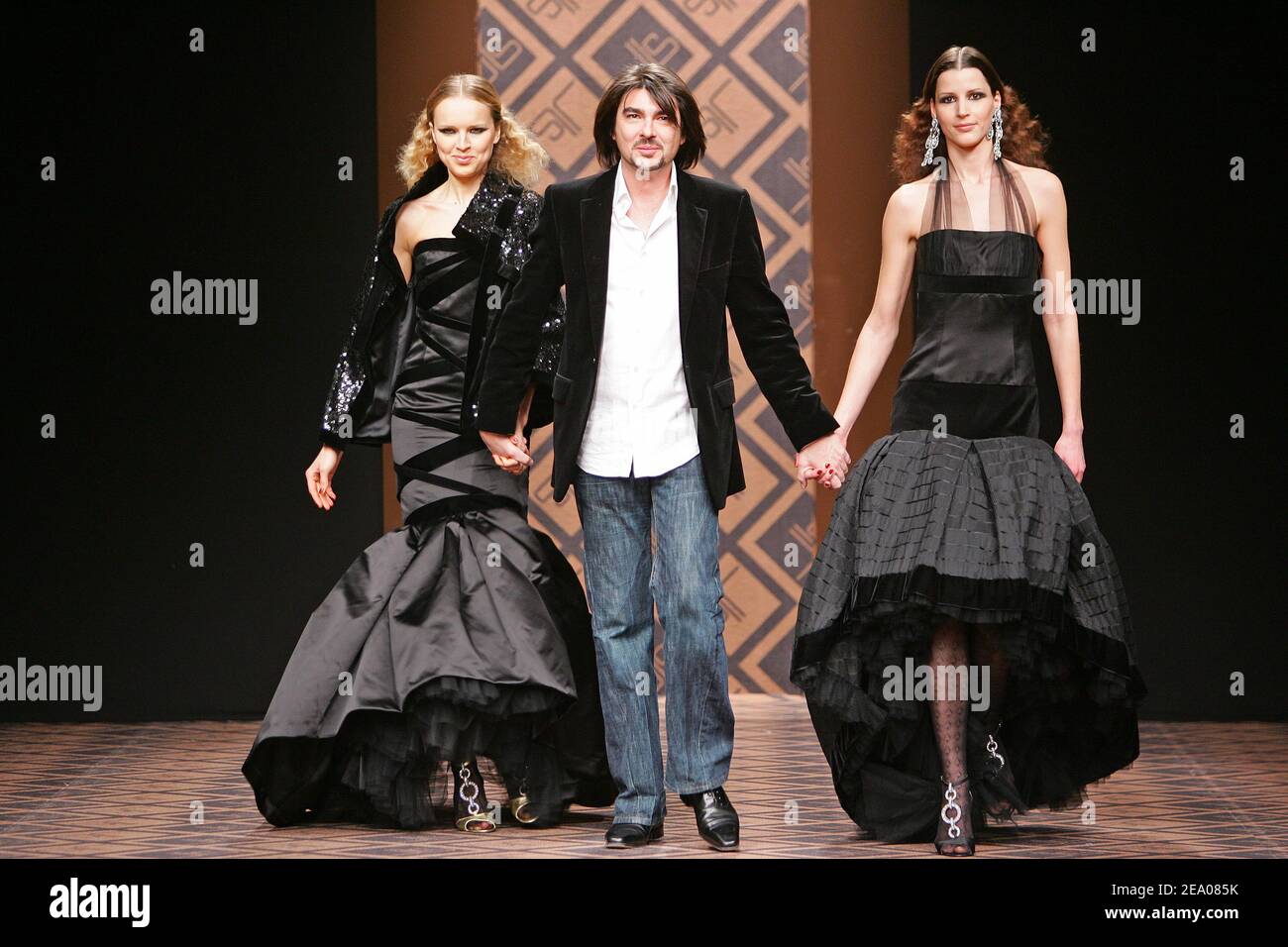 Flanked By Her Models High Resolution Stock Photography and Images - Alamy