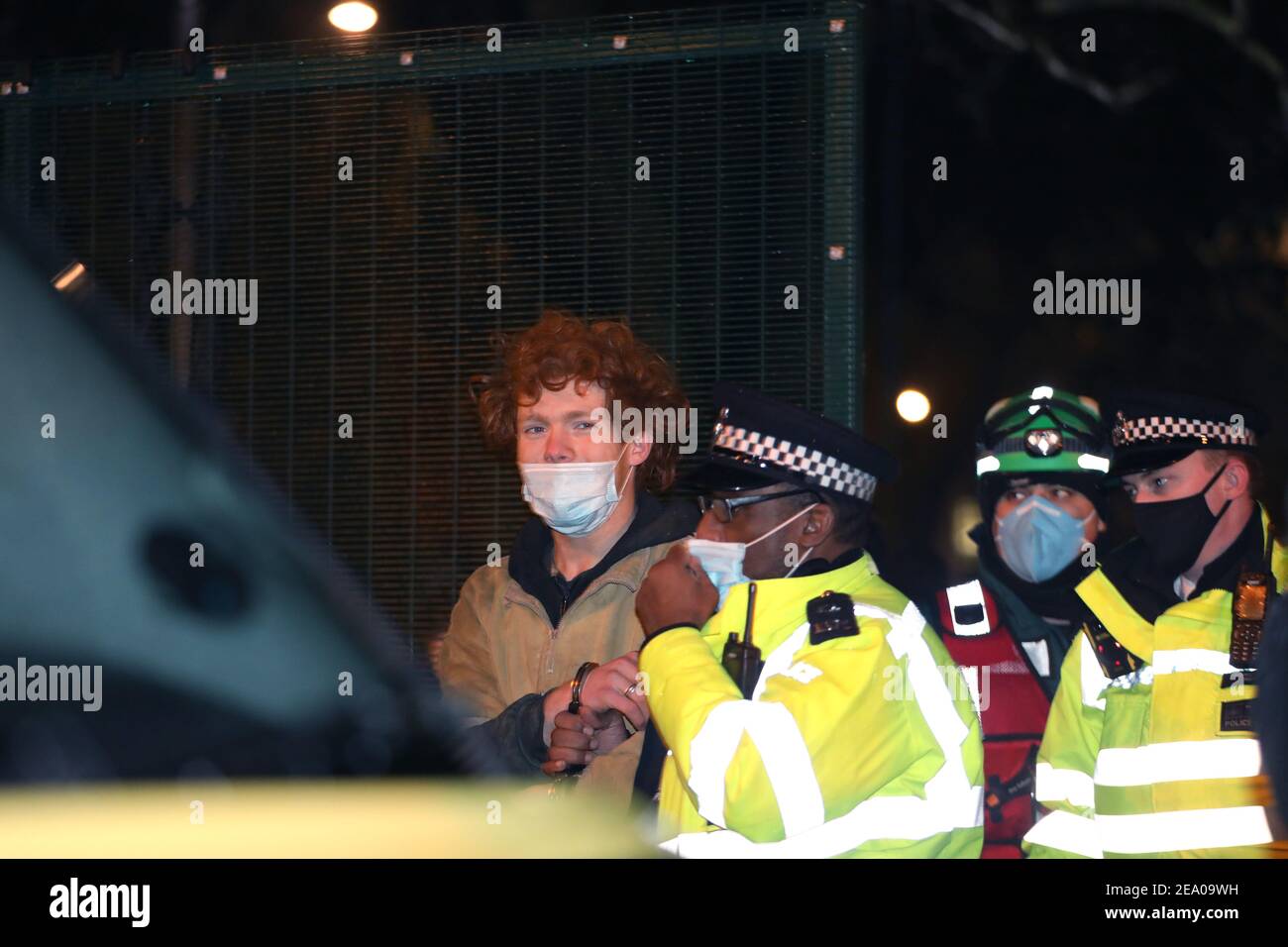 London, UK. 6th February, 2021. Lazer, one of the young tunnellers leaves the tunnel voluntarily on day ten of the Euston Square HS2 protest camp evictions, London, Saturday 6th February 2020 Credit: Denise Laura Baker/Alamy Live News Stock Photo