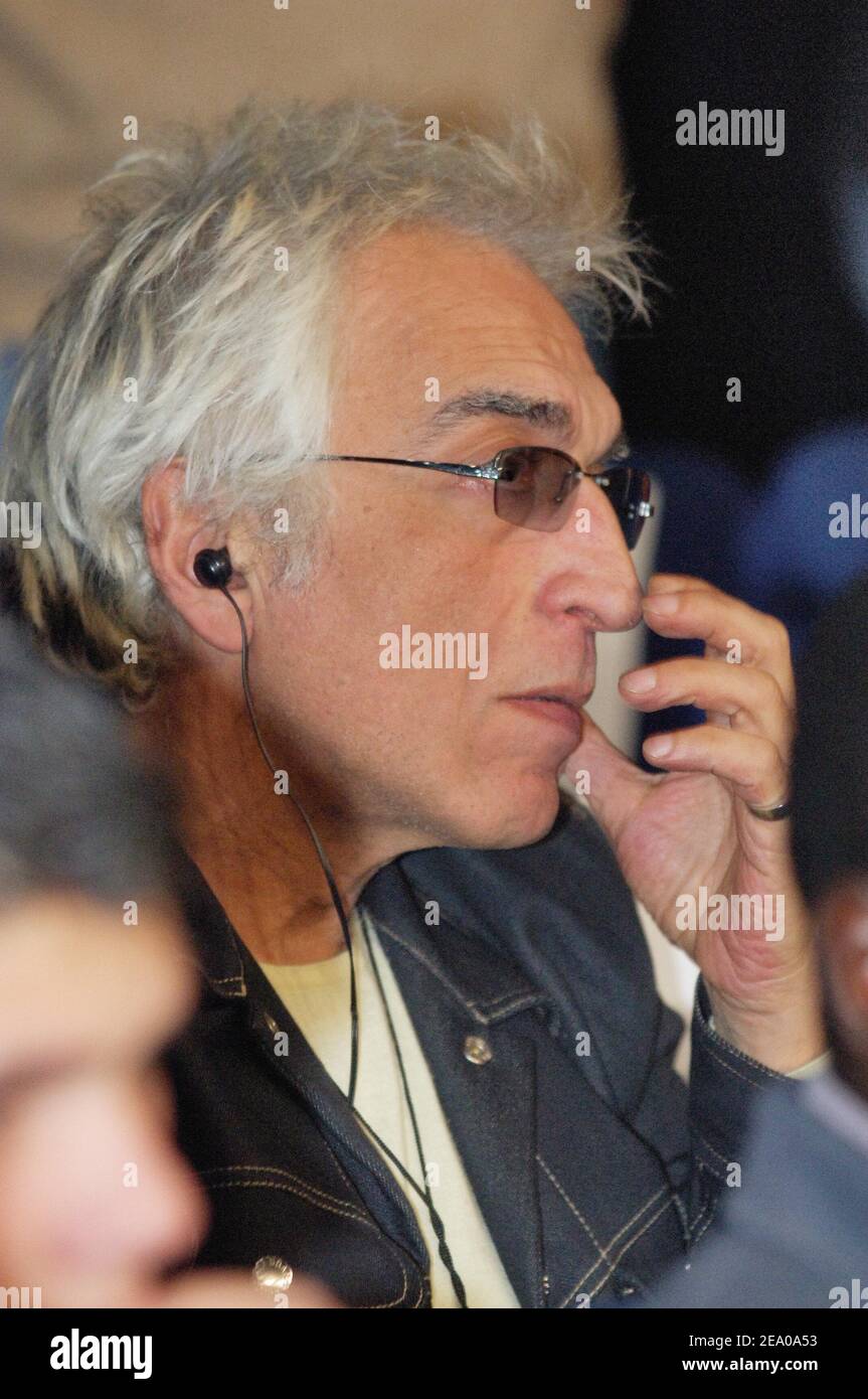 French actor Gerard Darmon attends the European Flyweight Championship boxing match between French Brahim Asloum and Spanish Jose-Antonio Lopez-Bueno at the Palais des Sports in Paris, France, on March 14, 2005. Asloum won by KO in round three. Photo by Edwin Cook/ABACA. Stock Photo
