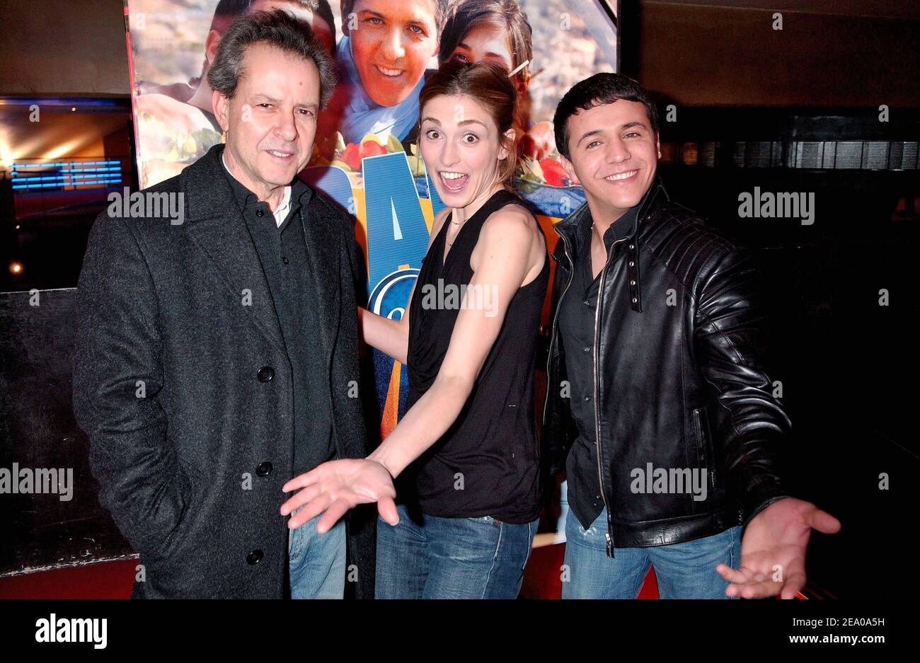 (L-R) French movie director Merzak Allouache, French actress and cast member Julie Gayet, French singer and cast member Faudel attend the premiere of the movie 'Bab El Web' in Paris on March 14, 2005. Photo by Bruno Klein/ABACA. Stock Photo