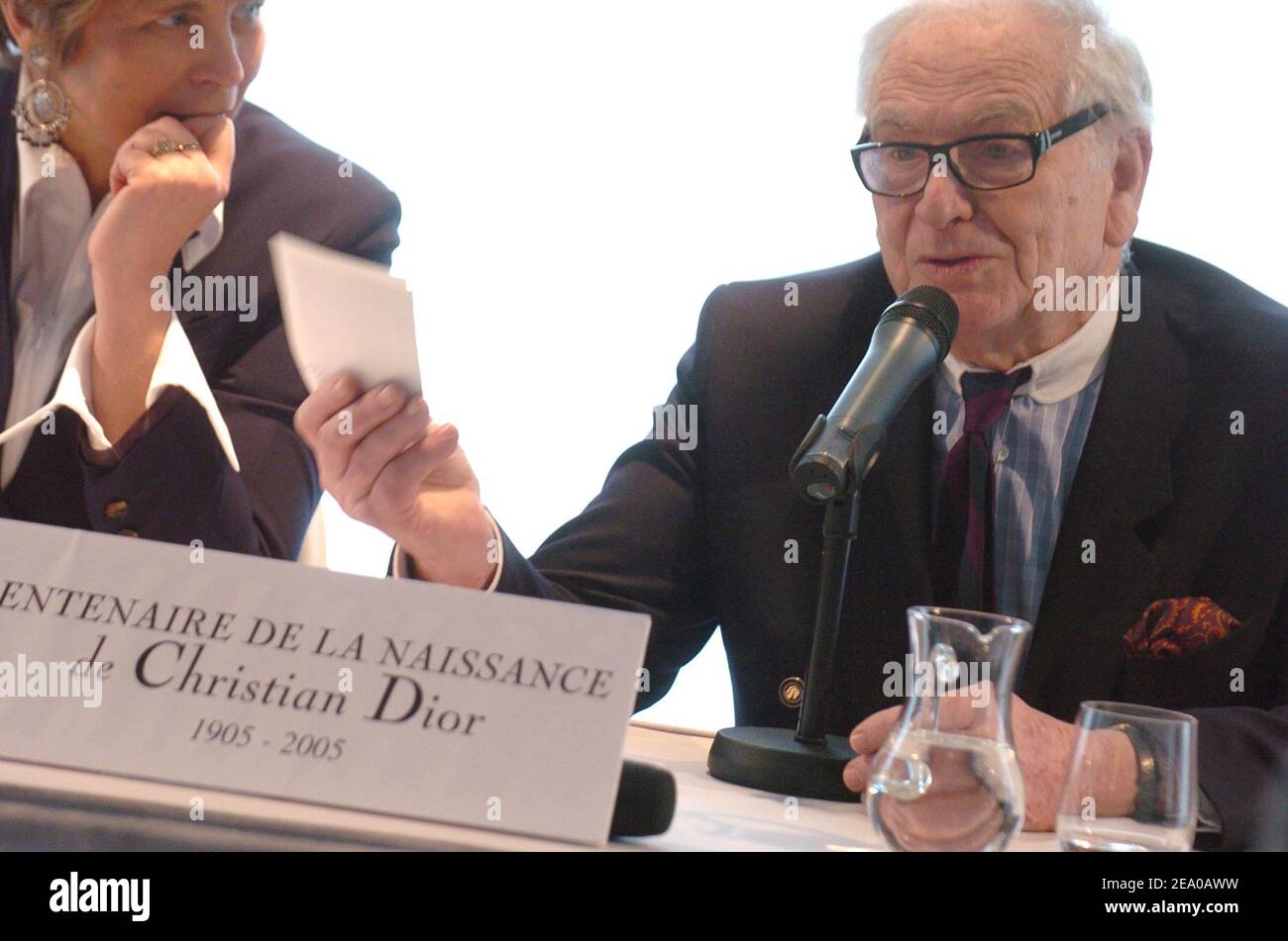 Bernard Arnault's daughter Delphine (R) and French fashion stylist Pierre  Cardin pose beside items on display after a press conference at the  occasion of Christian Dior's centenary at the headquarters of Christian