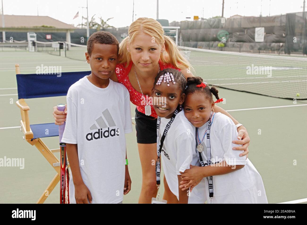 Russian Tennis player Anna Kournikova plays with young kids during the ' Adidas Clinic' in Miami, Florida, on March 21, 2005. Photo by Corinne  Dubreuil/CAMELEON/ABACA Stock Photo - Alamy