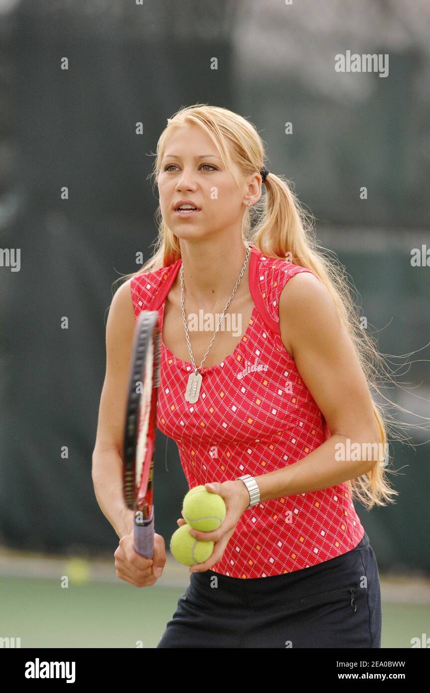 Russian Tennis player Anna Kournikova plays with young kids during the ' Adidas Clinic' in Miami, Florida, on March 21, 2005. Photo by Corinne  Dubreuil/CAMELEON/ABACA Stock Photo - Alamy