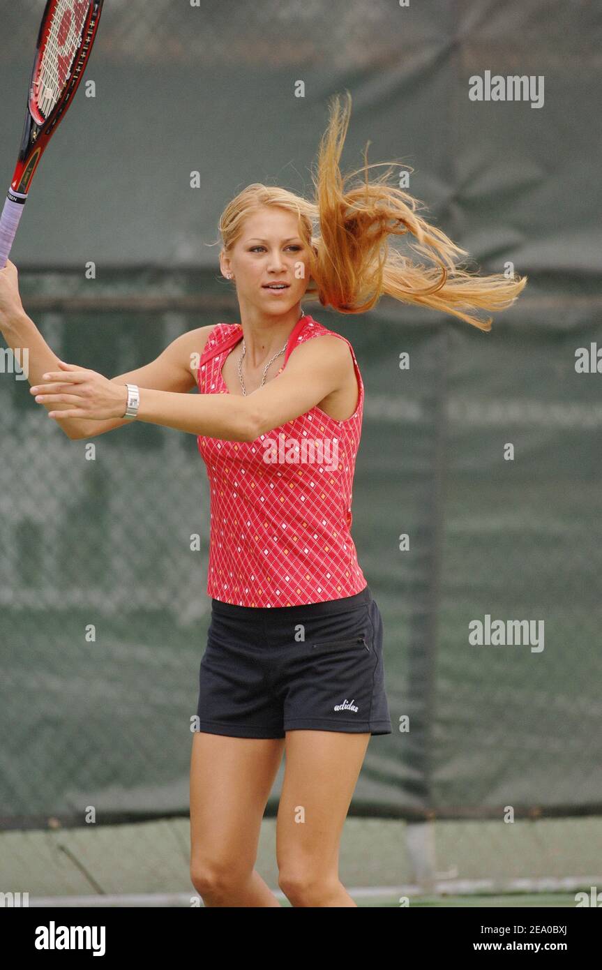 Russian Tennis player Anna Kournikova plays with young kids during the ' Adidas Clinic' in Miami, Florida, on March 21, 2005. Photo by Corinne  Dubreuil/CAMELEON/ABACA Stock Photo - Alamy