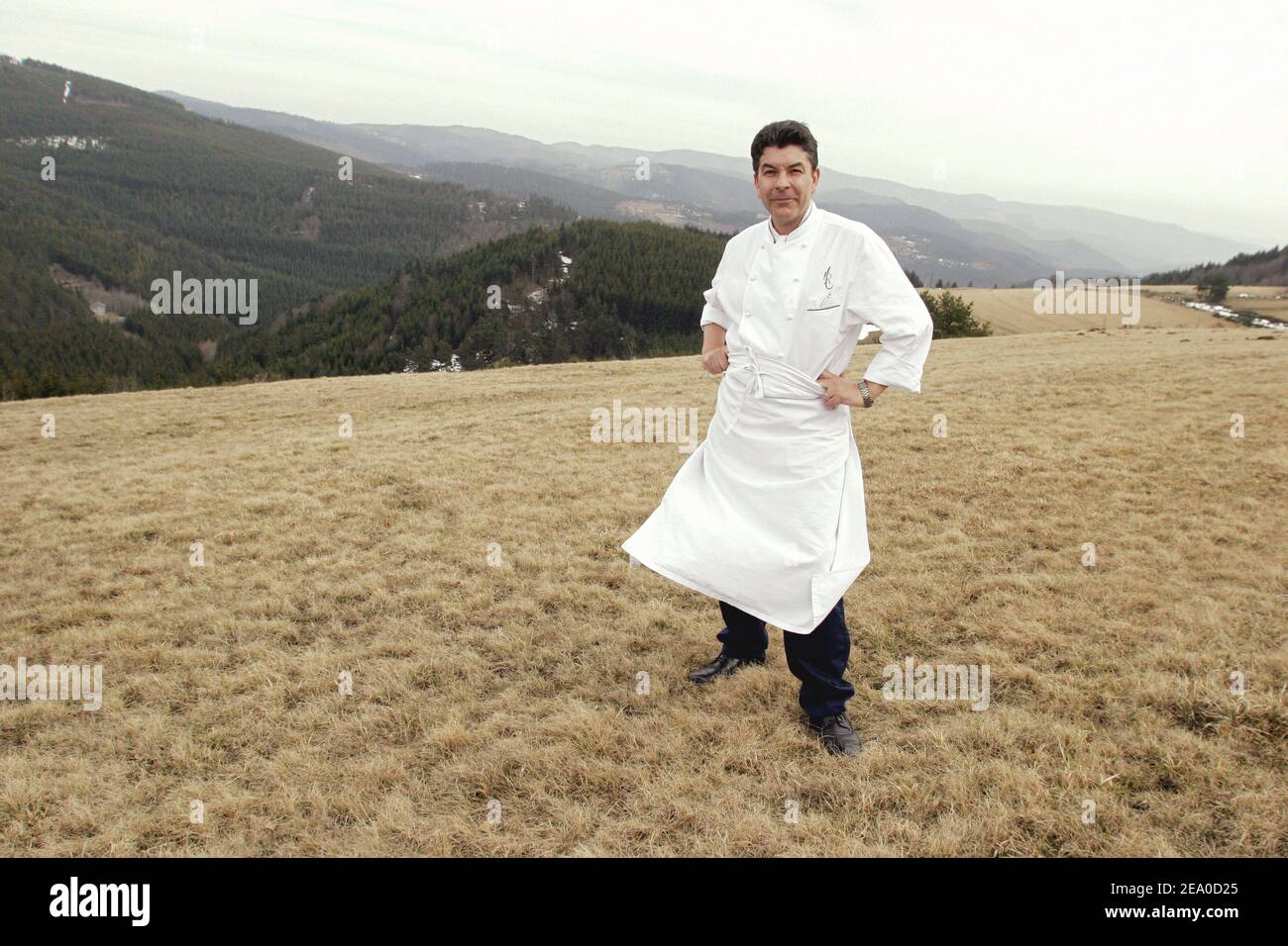 EXCLUSIVE. French Three Star Chef Regis Marcon poses outside his restaurant 'Le Clos des Cimes' in Saint-Bonnet-le-Froid, central France, on March 22, 2005, after he received his third star awarded by the Guide Michelin in its 2005 edition. Photo by Alexis Orand/ABACA. Stock Photo