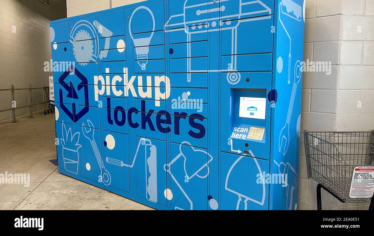 Orlando,FL USA - January 12, 2021:  The pickup lockers for online orders at a Lowes Home Improvement Store in Orlando, Florida. Stock Photo