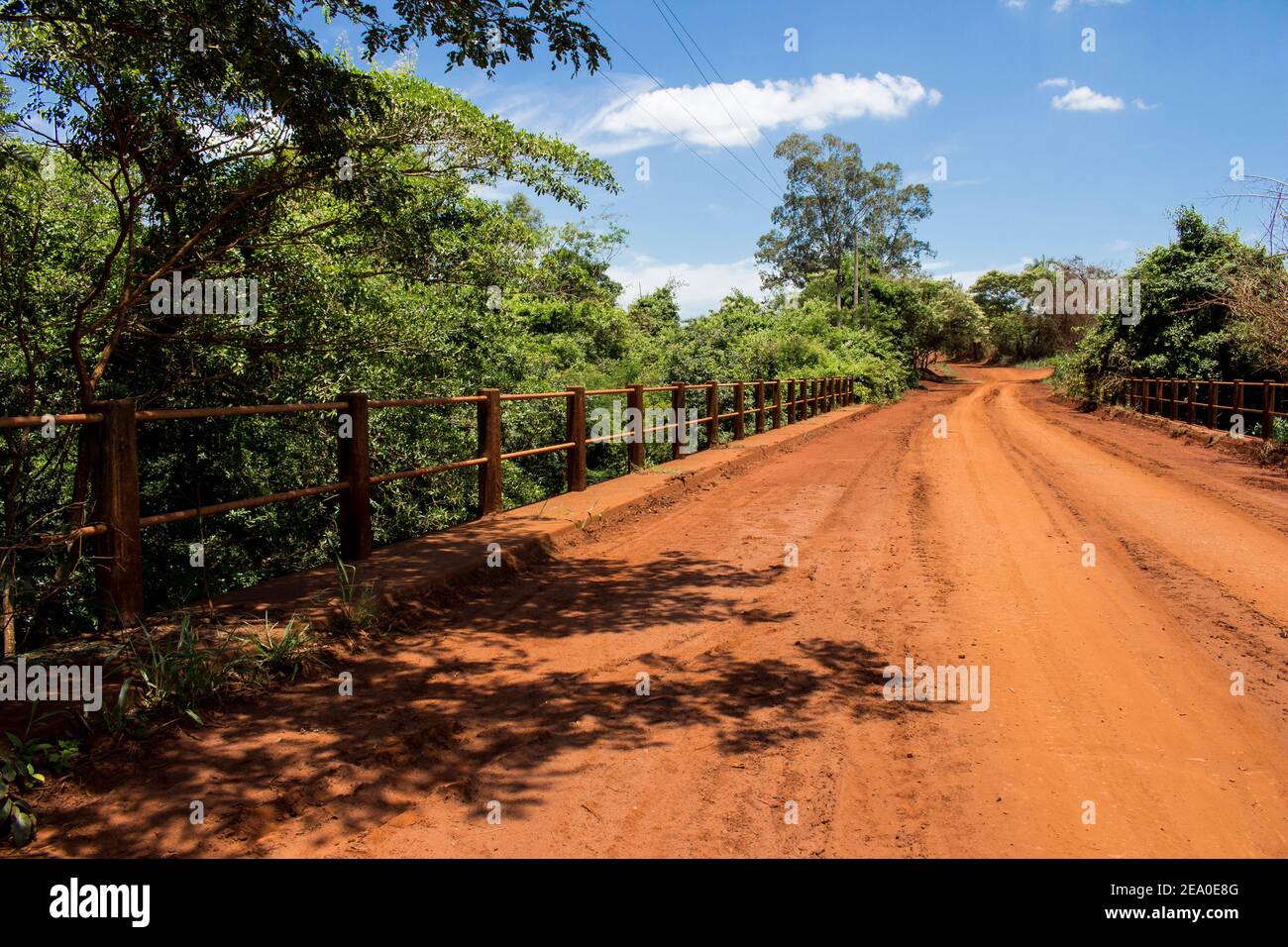 Dirt road with a bridge over Sao Lourenco river, at Sao Paulo state. Araraquara region Stock Photo