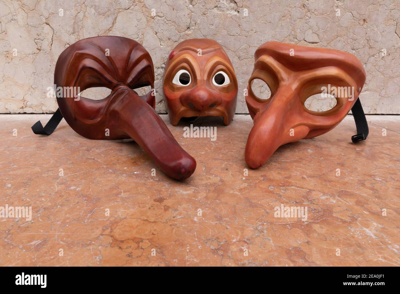Venetian Zanni masks by artist Carlo Setti. This is a leather mask of a typical servant character portrayed in Commedia Dell'Arte theatre. Stock Photo