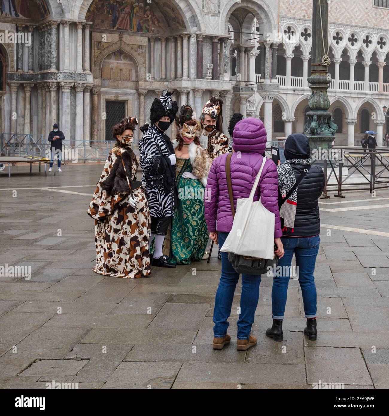 Photographing a carnival gathering during covid 19 restrictions in Venice February 2021 Stock Photo
