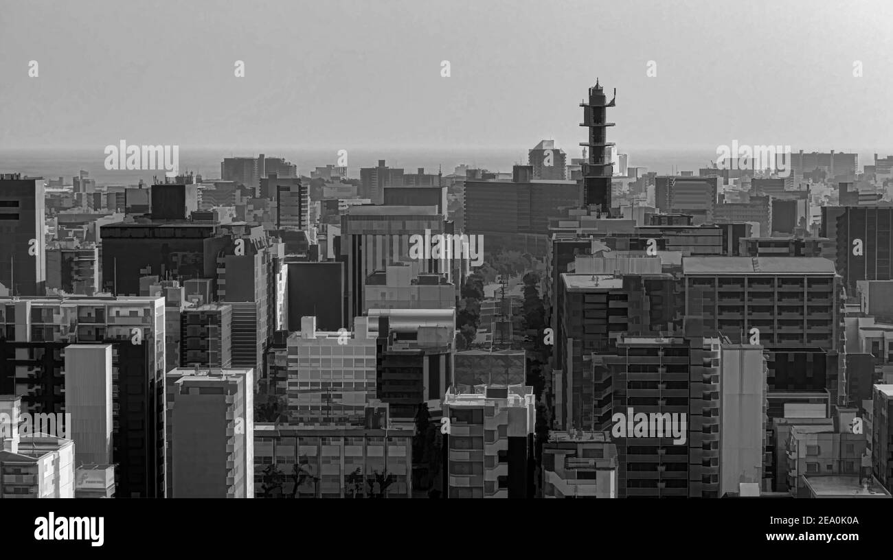 Hazy view over the south side of downtown Kagoshima city, Japan. Stock Photo