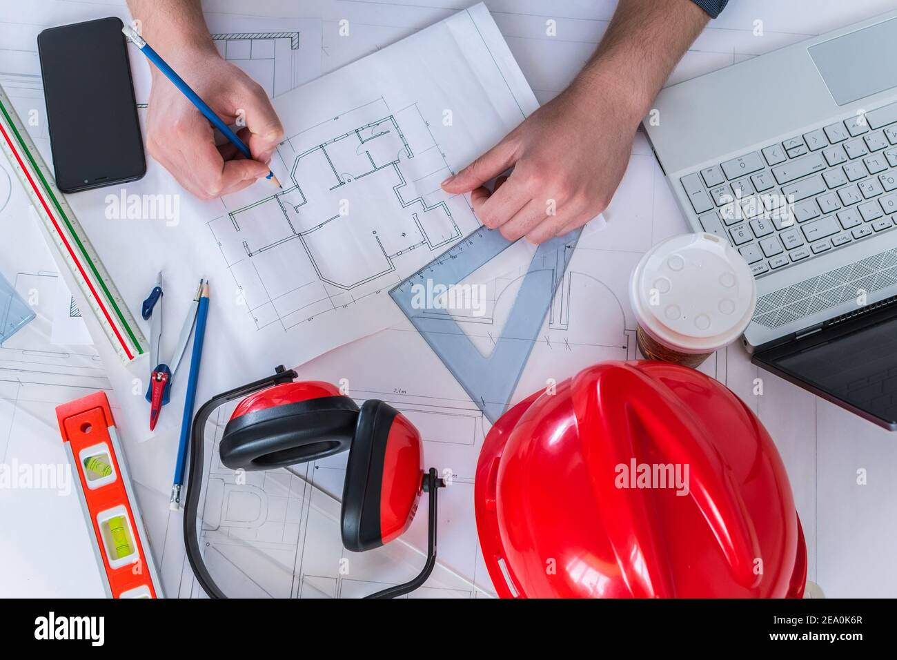 Architectural contractor, engineer, architect doing blueprint design