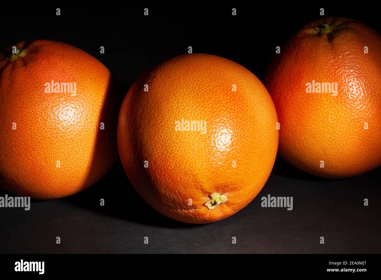 grapefruit group on black background Stock Photo