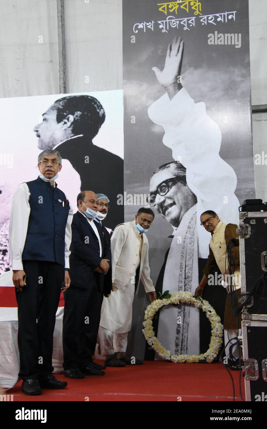 Muhammad Imran, High Commissioner of Bangladesh to India, Shaimum Sarwar Kamal, Member of Parliament, Bangladesh, Toufique Hasan, Deputy High Commissioner of Bangladesh, Kolkata, Dr. Hasan Mahmud, Information Minister, Bangladesh and Subrata Mukherjee, Cabinet Minister of West Bengal Govt., India (L-R) garland to the image of Sheikh Mujibur Rahman at the commemoration ceremony of fifty years of the historical public meeting by Indira Gandhi, Prime Minister, India and Sheikh Mujibur Rahman, Prime Minister, Bangladesh, at Brigade Parade Ground in Kolkata that was held on 6th February, 1972, afte Stock Photo